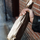 The mysterious paper bag that has confounded Sgt. Ted Vittorio
(inset) and other police officers.